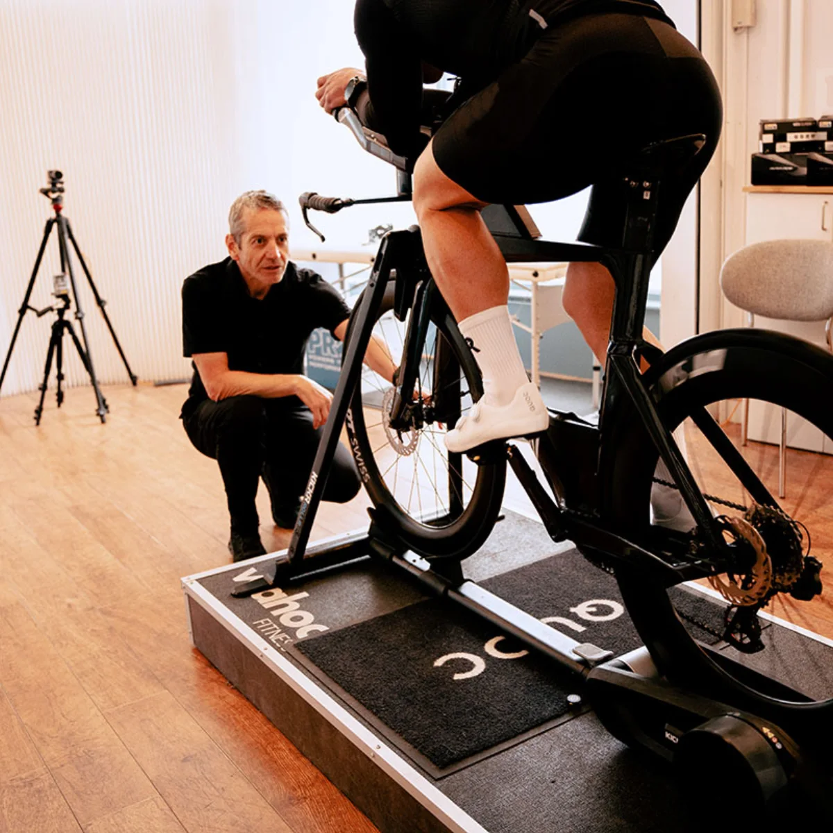 Richard Melik assessing a cyclist's position during a bike fit at Freespeed